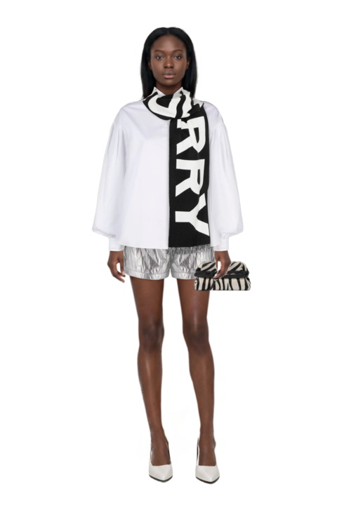 Outfit zebra-print leather clutch bag and fame leather pumps