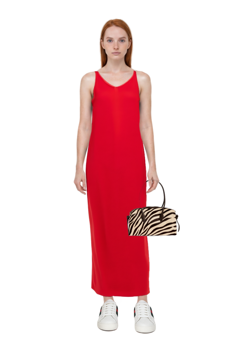 Outfit asymmetric sleeveless dress and brioche duffle zebra-print shoulder bag