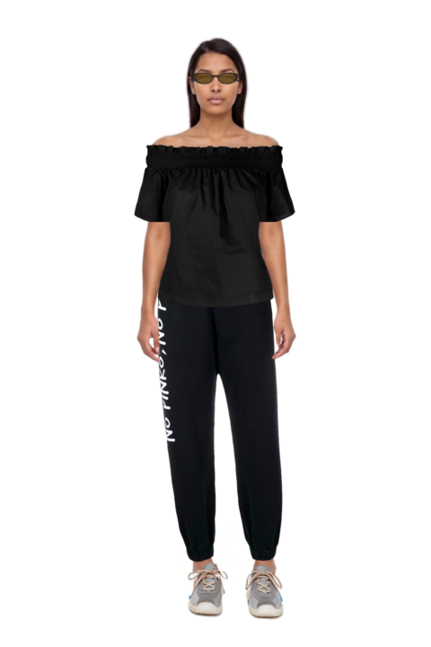 Outfit bubble technical fabric and suede sneakers and oval-frame sunglasses