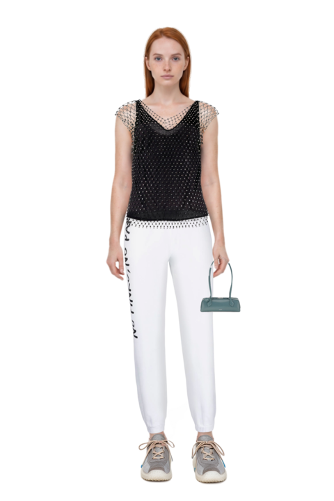 Outfit bubble technical fabric and suede sneakers and small le teckel shoulder bag