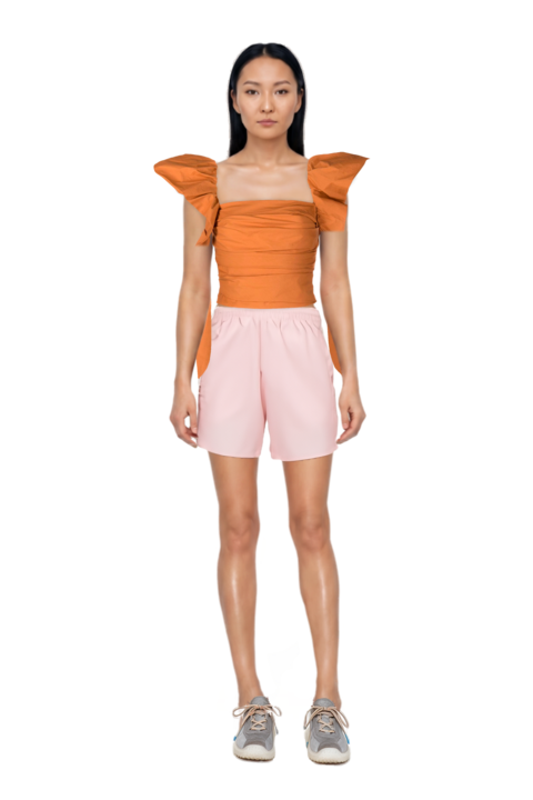 Outfit nylon shorts and bubble technical fabric and suede sneakers