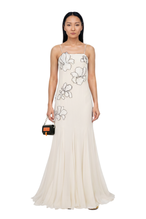 Outfit suede sneakers and flower-appliqués silk maxi dress