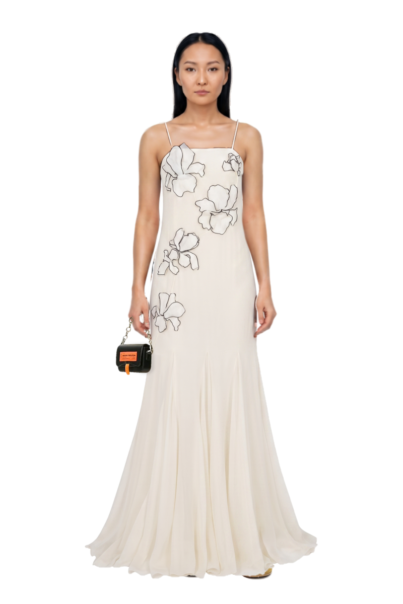 Outfit suede sneakers and flower-appliqués silk maxi dress
