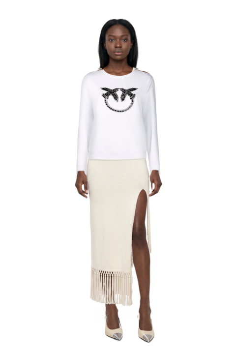 Outfit cassandre-plaque pumps and sahara lace-up fringe midi dress