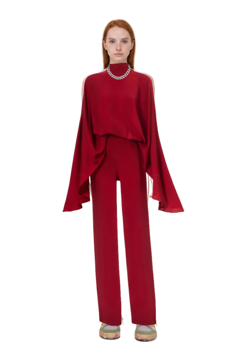 Outfit eolia cape jumpsuit and ball star sneakers