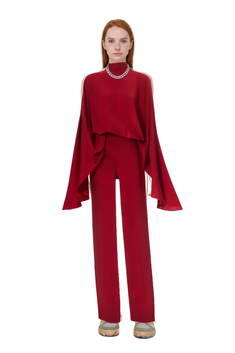 Outfit eolia cape jumpsuit and ball star sneakers